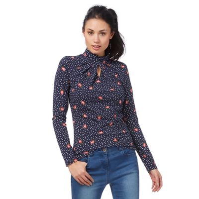 Navy spotted rose bud print cut-out turtle neck top